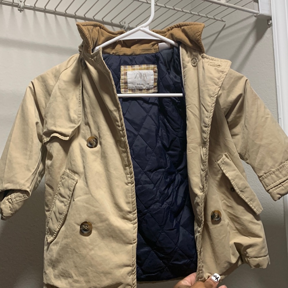 Tan trench coat in good condition
